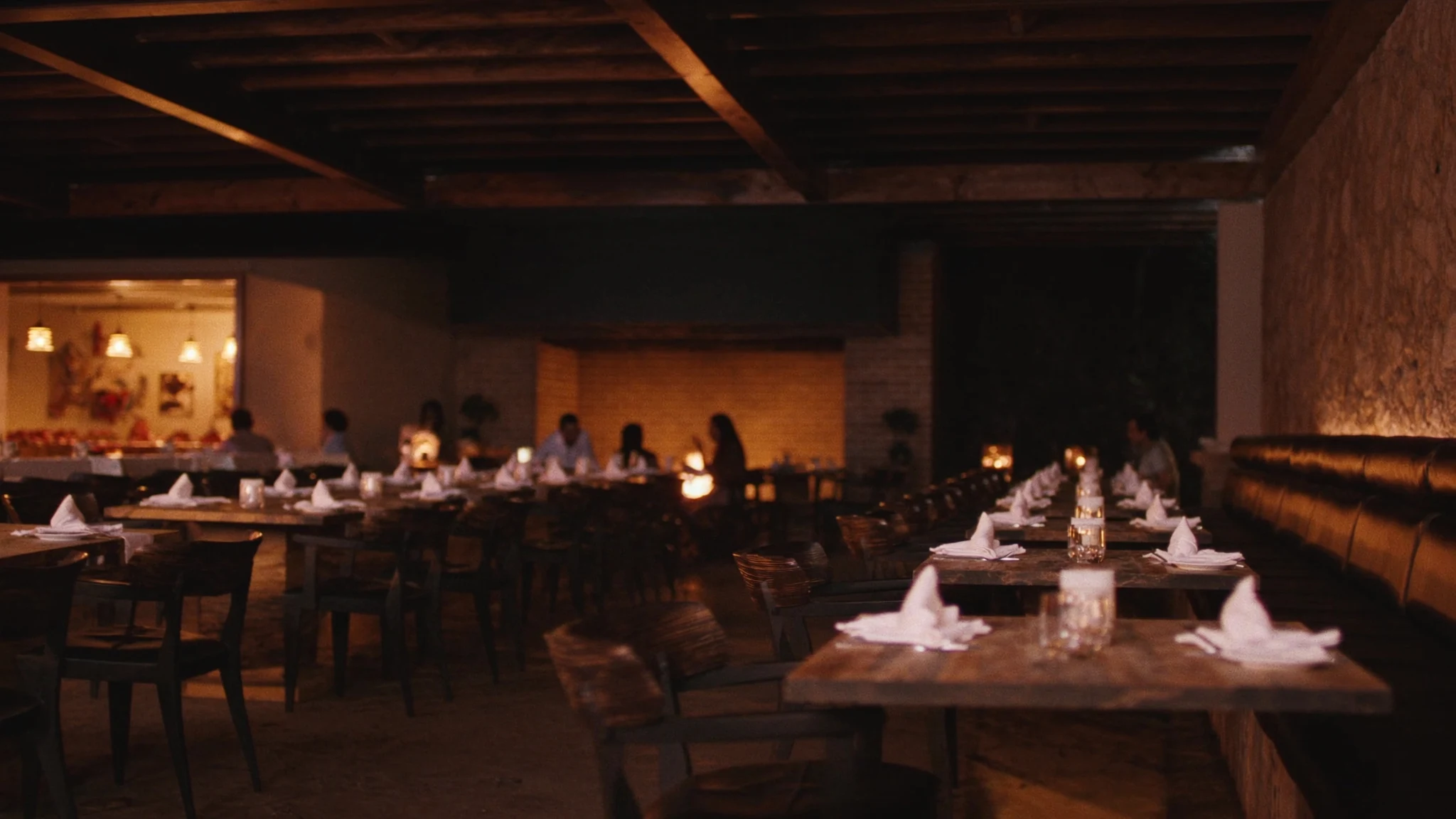 The warm, low-lit Emberhollow dining room